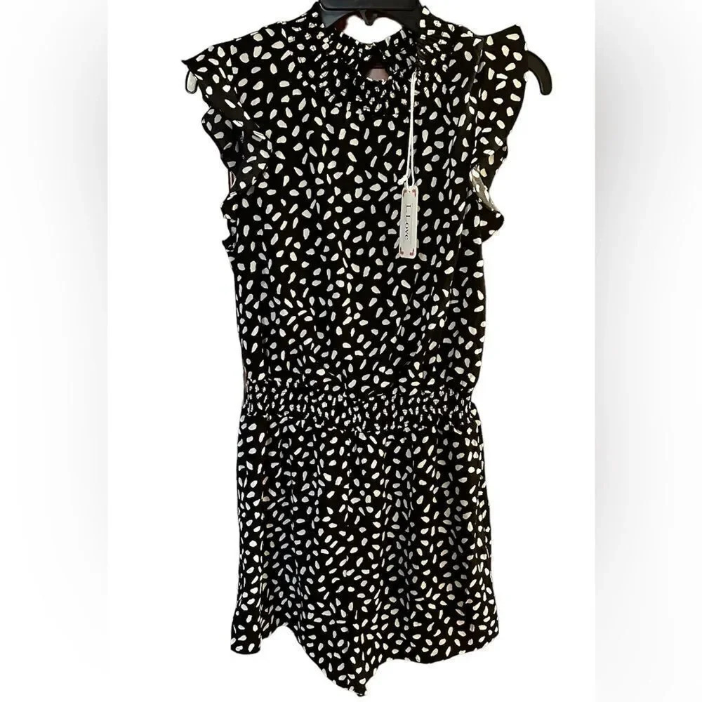 L Love black and white ruffle shorts romper.  NWT